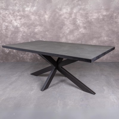 Grijze eettafel met natuursteen bovenblad.